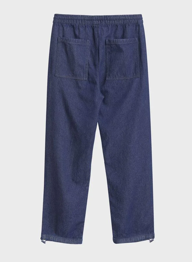 The Indian Garage Co  Men Relaxed Fit Solid Patch Pocket Mid-Rise Jeans for Men | Best Price UAE